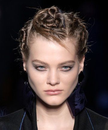 On the Armani runway, the hairstylists separated the hair into sections and did multiple twists, all leading into intricate buns. Armani Runway, Twisted Bun, Best Acne Products, Twist Bun, Total Beauty, Bun Styles, Beauty Samples, Favorite Hairstyles, Inner Beauty