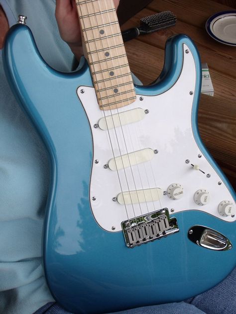 The history behind the development of the Stratocaster Plus Series is quite interesting. White Stratocaster Aesthetic, Electric Guitar Pretty, Strat Electric Guitar, Light Blue Electric Guitar, Blue Stratocaster Guitar, Dream Guitar, Fender Guitars Stratocaster, Blue Electric Guitar, Blue Electric