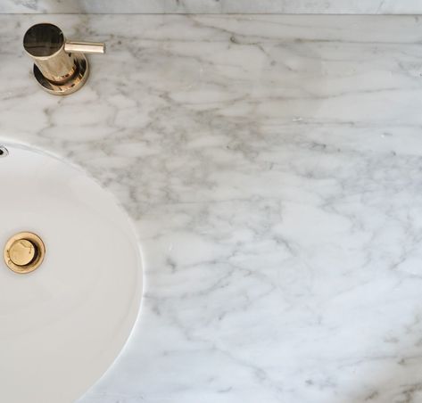 Bathroom Marble Regrets: Why we regret adding marble in 3 of our bathrooms. This is a must-read if you're considering using marble in a bath. Artwork For Marble Bathroom, Bathroom Countertops Marble, Mixing Marble In Bathroom, Carrera Marble Bathroom Countertop, Carrara Marble Tile Bathroom, Marble Counters Bathroom, Polished Marble Bathroom, Gray Marble Bathroom Countertop, Carrara Marble Bathrooms