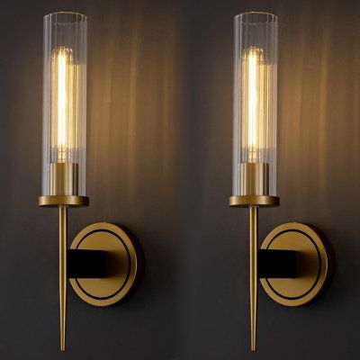 Made of glass and metal, this set of wall sconces comes with a complete set of parts and installation instructions for easy installation, this wall sconce is ideal for bathrooms, hallways and entry ways, bedrooms, living rooms, dining rooms, staircases, home offices, commercial spaces. Orren Ellis Finish: Gold | Orren Ellis Dubravko 2 -Light Wall Sconces Wallchiere (Bulbs Included) yellowGlass / Metal in Gold | 17.7" H X 4.72" W X 5.7" D | Wayfair Sconces Going Up Stairs, Dining Room Wall Sconces Lights, Modern Wall Sconces Bathroom, Picture Wall Ideas With Scones, Sconces Stairway Wall, Entryway Sconces Ideas, Sconces Fireplace Wall, Scones Light Wall Sconces, Wall Sconces Stairway