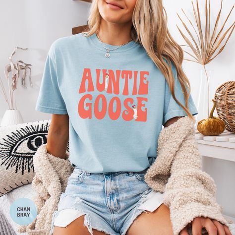 Surprise the coolest aunt-to-be with this Comfort Colors Silly Goose Auntie Shirt, the perfect Cool Aunt Announcement for a fun and playful aunt reveal! This trendy Aunt Reveal T-shirt makes a great Gift for Aunt to Be, whether for a sister, bestie, or family member--perfect for a New Anty Gift or a stylish Best Aunt Tee she'll love to wear! ✨ Why You'll Love It: ✔ Premium Comfort Colors Tee - Made with 100% ring-spun, soft-washed cotton for an ultra-comfy feel; ✔ Relaxed & Oversized Fit - Perfe Aunt Announcement, Aunt To Be, Cool Aunt, Auntie Shirts, Gift For Aunt, Best Aunt, Gift Sister, Silly Goose, Cozy Loungewear