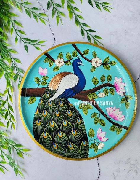 Embrace the elegance of a peacock pichwai painting wall plate, bringing art and positive vibes to your space. 🦚✨ #peacockpainting #pichwai #wallplate #wallplates #festivedecor Pichwai Art Peacock, Pichwai Motifs Sketches, Round Pichwai Painting, Simple Pichwai Painting, Peacock Pichwai Painting, Pichwai Paintings Peacock, Painting Ideas On Plates, Pichwai Wall Art, Pichwai Wall Painting