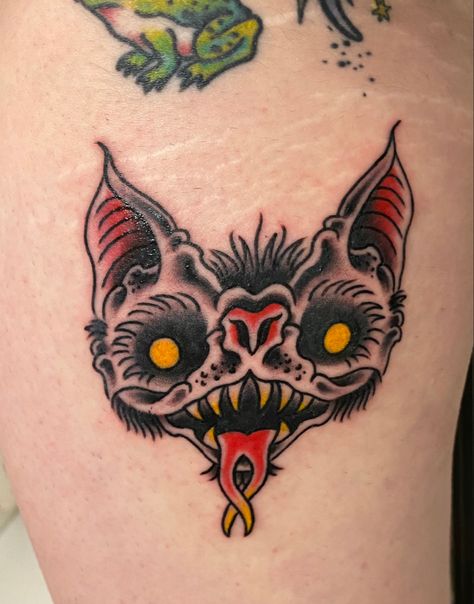 Traditional style tattoo of a bat’s face with a split tongue and yellow eyes Two Headed Bat Tattoo, Bat Face Tattoo, Neo Traditional Bat Tattoo, Dracula Bat Tattoo, Traditional Bat Face Tattoo, Neotraditional Bat Tattoo, Illustrative Bat Tattoo, Bat Face, Austin Tattoo