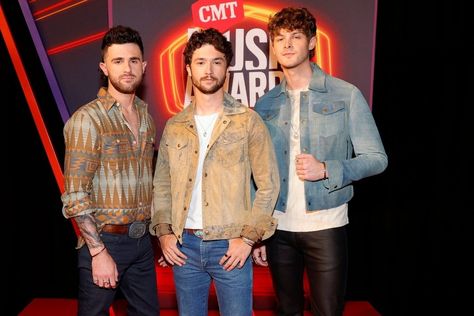 Colton Pack, Garrett Nichols and Zach Beeken of musical group Restless Road attend the 2021 CMT Music Awards at Bridgestone Arena on June 09, 2021 in Nashville, Tennessee. (Photo by Jason Kempin/Getty Images for CMT) Be still my heart, Restless Road definitely know how to bring out the tears. The trio recently released their latest single, "Growing Old With You" which has fans excited for their new material. The band showcases their beautiful melodies, with lyrics that make you want to grab your Restless Road, Charles Kelley, Yours Lyrics, Country Scenes, Country Men, Maybe One Day, Musical Group, Round The World, Nashville Tennessee