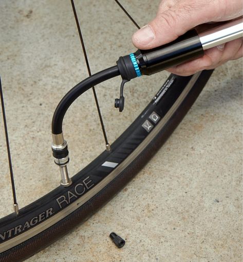 Though compact and lightweight, this bicycle pump is certainly not “light duty.” Just over 6 1/2" long and weighing only 3 oz, it’s portable enough to bring with you on the road and is built to handle plenty of use. It has a strong aluminum alloy housing – no flimsy plastic here – as well as robust, dependable seals, minimizing air leakage. The flexible 4 1/4" outlet hose is easily snaked around spokes to register it on a tire valve. The reversible hose has a Schrader fitting on one end and a Pr Bicycle Pump, Lee Valley Tools, Bike Pump, Bike Tools, Muscle Power, Lee Valley, Cool Bike Accessories, Bicycle Frame, Bicycle Components