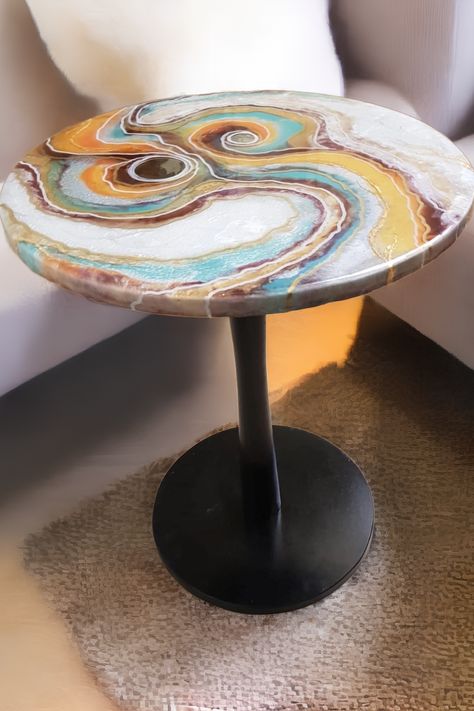 Our resin tables feature a beautiful blend of natural stone and glossy epoxy resin, creating a one-of-a-kind piece that will be the centerpiece of any room. The geode art and geode tables are inspired by the natural beauty of crystals and minerals, with intricate details that mimic the mesmerizing patterns found in nature. Our entry tables are perfect for adding a touch of elegance to your foyer or hallway that will attract your guests. Entry Tables, Geode Art, Epoxy Resin Table, Handmade Table, Resin Table, Round Coffee Table, Coffee And End Tables, Epoxy Resin, Natural Stones