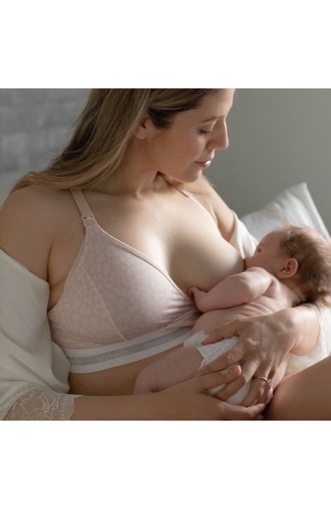 This racerback bra offers exceptional comfort for pregnant or nursing mothers in a sustainable, soft blend for all-day support. Snap-down soft cups provide easy one-handed access. 49% organic cotton, 32% Tencel® modal, 19% spandex Tencel modal is a sustainably produced fiber made with closed-loop processing and is certified with the EU Ecolabel as having a low environmental impact throughout the entire lifecycle Machine wash, line dry Imported OEKO-TEX®–certified materials free of harmful substa Postpartum Belly Wrap, Postpartum Outfits, Postpartum Tummy, Mom Milk, Post Partum Belly Wrap, Hospital Gowns, Postpartum Essentials, Post Partum Outfits, Belly Wrap