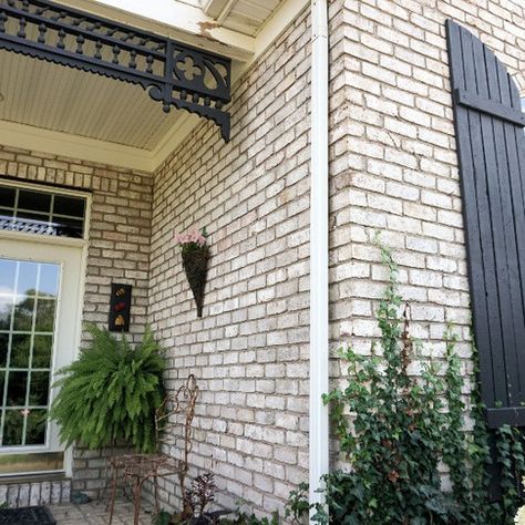 White Stained Brick Exterior, Brick Stain Colors Exterior, Mortar Washed Brick Exterior, Staining Brick Exterior, Diy Brick Staining Exterior, Brick Staining Exterior, Beige Brick Veneer, Brick Stain Exterior Before And After, Stained Brick House Exterior