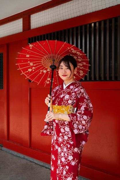 Free photo woman holding wagasa umbrella... | Free Photo #Freepik #freephoto #traditional-culture #oriental #culture #lifestyle Holding Umbrella Reference, Wagasa Umbrella, Umbrella Outfit, Morton Salt Girl, Holding Umbrella, Japanese Traditional Clothing, Umbrella Corporation, Photo Woman, Traditional Culture