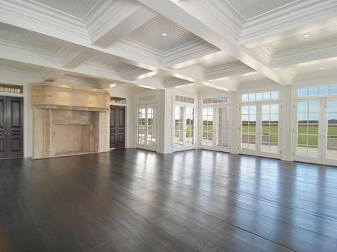 Empty living or family room in a Hamptons farm with coffered ceiling, large windows, French doors, wood floor and a massive fireplace Empty Room, Coffered Ceiling, House Goals, Home Fashion, My Dream Home, Future House, French Doors, Great Rooms, Wood Floors