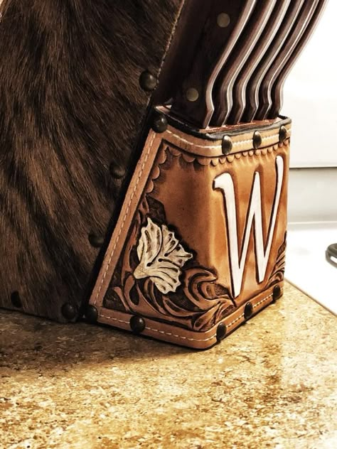 Western Leather Projects, Tooled Leather Projects Ideas, Wood And Leather Projects, Leather Furniture Decor, Western Dinnerware, Cowhide Decor, Ranch House Decor, Leather Kitchen, Ashley Home