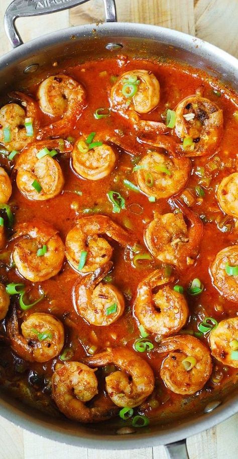 Spicy Cajun Shrimp with lots of sauce – delicious Southern dinner or appetizer!  Made with garlic, ketchup, chicken broth, hot sauce, Cajun spice, and green onions.  Super easy to make – 30 minutes from start to finish! #spicy #Cajun #shrimp #spicyshrimp #Cajunshrimp #seafood #Southernfood #Southernrecipe Shrimp Spicy Recipes, Sauce Pecan Cajun, Ketchup Chicken, Cajun Shrimp Sauce, Rice Dinner Recipes, Spicy Cajun Shrimp, Seafood Extravaganza, Cajun Shrimp And Rice, Pumpkin Pancakes Easy