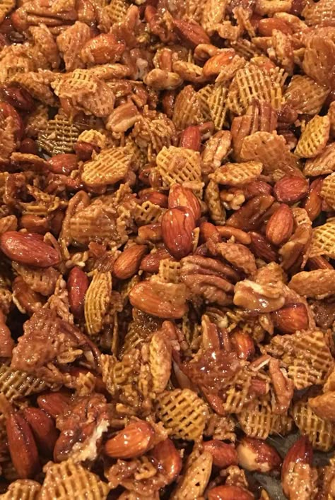 Crispix® cereal, pecans, and almonds are baking in a buttery sweet syrup creating a crunchy snack perfect for the Christmas season. Sweet Party Mix Recipe, Sweet Party Mix, Caramel Snack Mix, Cocktails Design, Christmas Snack Mix, Crispix Cereal, Fall Snack Mixes, Party Mix Recipe, Xmas Candy