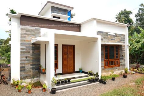 Today we come up with a Stunning small budget house built for 16 lakh. The total area of this home is 750 square feet. This home is situated near Edappal at Kerala. Exterior look of the home is very beautiful.This is a 2 BHK home ,required land area is 5 cent plot. It is a box style flat roof home design with simply attracted exterior view. Windows and doors are made by wood. White and coffee brown color paint combination and also show wall tiles bring more elegant look to this home. Small House Design Kerala, Small House Design Philippines, Low Budget House, Indian House Design, Budget House Plans, Kerala House, Simple Bedroom Design, Kerala House Design, Simple House Design