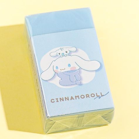 Use this super cute blue eraser to keep your notes nice and clean! It features prints of Cinnamoroll wearing a bunny onesie while hanging out with his friend Milk. Make sure you bring this eraser along with your pencils in your pen case. Aesthetic Eraser, Cinnamoroll Stationary, Kawaii Ideas, Saving Account, School Dr, Bunny Onesie, Random Products, Kitty Items, Duck Art