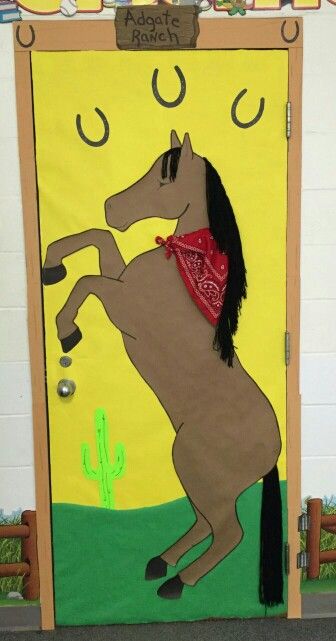 Western themed door #schooldoor #western #creativedoor #schooldecor Western Door Decorations For School, Texas Theme, Holiday Door Decorations, Wild West Theme, Library Themes, School Door Decorations, Horses Theme, Western Theme Party, School Doors