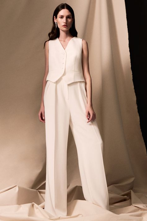 Woman wearing an ivory silk waistcoat and trouser suit Mens Tailoring, Minimalist Bride, Trouser Suit, Contemporary Wedding, Civil Ceremony, Silk Trousers, Couture Wedding, Silk Organza, West London