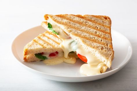 Grilled cheese and tomato sandwich on wh... | Premium Photo #Freepik #photo #food #wood #leaf #bread Cheese And Tomato Sandwich, Sandwich Recipe Videos, Paneer Pizza, Paneer Sandwich, Hunger Pangs, Paneer Cheese, Cheese And Tomato, Baked Bbq Chicken, Tomato Sandwich