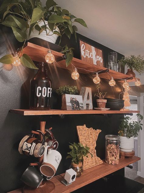 Coffee Bar Kitchen Shelves Plants Shelf Decor Lights Coffee Mugs Minnesotan Coffee Bar With Plants, Boho Coffee Bar, Plant Station, Shelves Plants, Plants Shelf, Coffee Bar Kitchen, Coffee/wine Bar, Home Decor Shelves, Bar Shelf