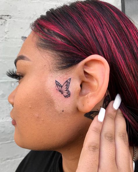 Butterfly On Face Tattoo, Two Butterflies Tattoo Behind Ear, Small Butterfly Face Tattoo, Kneck Tattoos, Sideburn Tattoo Women, Small Face Tattoo, Woman Butterfly Face Tattoo, Butterfly’s Behind Ear, Simon Tattoo