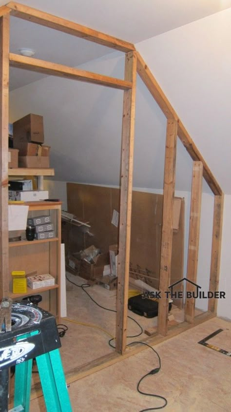 This wall was built with very simple tools. It took less than one hour. Photo Credit: Tim Carter Slanted Ceiling Closet, Attic Closet Ideas, Eco Houses, Slanted Walls, Attic Renovation Ideas, Attic Bedroom Designs, Angled Ceiling, Finished Attic, Attic Closet