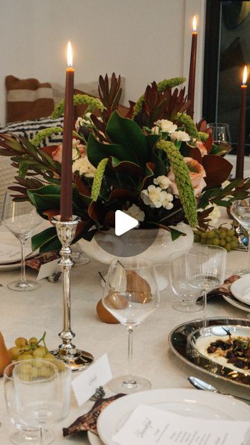 Pottery Barn on Instagram: "Create a floral centerpiece for Thanksgiving with tips from @Hauste: 
 •Choose the right vessel. @Hauste used our Heritage Tureen to give them plenty of space for a lush, layered look. •Anchor your arrangement with a floral foam block to keep every stem in place. •Start with greenery to set a rich, textured backdrop for your florals. •Add focal stems, then fill the arrangement with accent stems to add depth and variety. •Finish off the look with an unexpected touch. We love how @Hauste used figs to incorporate the season’s harvest.
 Tap to recreate the look! #mypotterybarn" Leaves Arrangement, Textured Backdrop, Magnolia Table, Foam Blocks, Magnolia Leaves, Floral Centerpiece, Jolly Holiday, Floral Foam, Floral Centerpieces