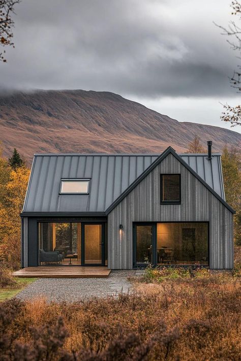 Modern Scandinavian house with wooden facade and large windows. These Scandinavian modern houses are a hug of architecture — a sleek, nordic sanctuary with a dash of whimsy. Nordic Wooden House, Mountain Cabin Modern, Modern House With Floor Plan, House Exterior Scandinavian, Nordic House Design Exterior, Modern Wooden House Design, Tiny Home Exteriors, House Design Scandinavian, Scandinavian Exterior House