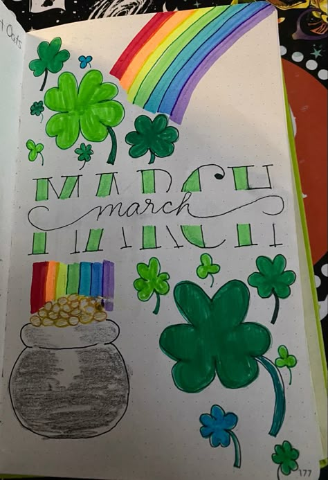 Center page has March written in two split styles in green with clovers and a four leaf clover in shades of green above the left and below the right of March. Bottom left has a pot of gold with a rainbow shining from the pot of gold arching over the top right of March. March Notebook Ideas, March Drawings Ideas, Planer March, March Scrapbook Ideas, March Dot Journal, March Calendar Doodles, March Dot Journal Ideas, March Chalkboard Ideas Calendar, March Journal Page