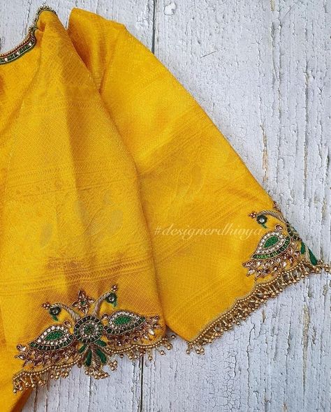 Simple Aari Work Blouse Design Yellow, Simple And Unique Aari Work Blouse Design, Gold Color Maggam Work Blouse, Elegant Aari Work Designs, Kundan Hand Embroidery, Silk Saree Blouse Designs With Work, Kundan Blouse Work, Sleeve Border Aari Work, Kundan Maggam Work Blouses