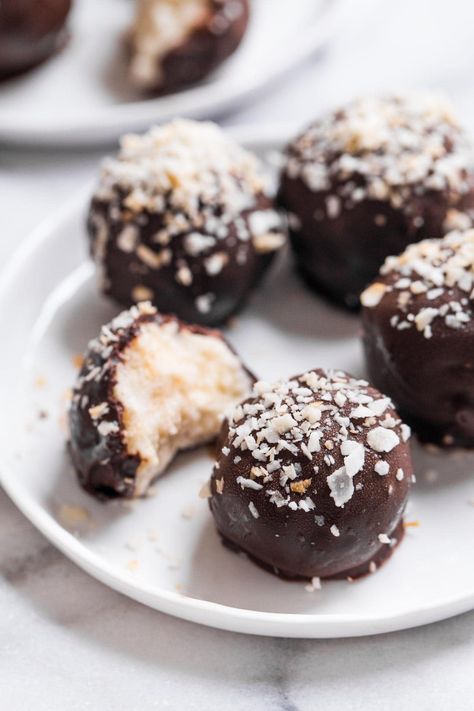 These dark chocolate coconut bites are naturally sweet and creamy on the inside and covered with a layer of delicious chocolate! #dessert #snack #chocolate #yummy #recipe | pinchofyum.com Mounds Bars, Bounty Bars, Dark Chocolate Coconut, Coconut Filling, Coconut Bites, Chocolate Bites, Coconut Desserts, Slow Cooker Desserts, Unsweetened Coconut