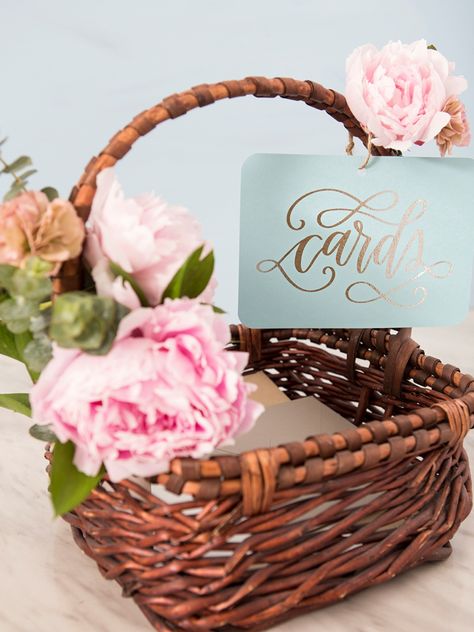 Grab our printable design to make your own wedding card basket! Basket Card Box Wedding, Wedding Shower Basket Ideas, Basket For Cards At Party, Basket For Cards At Wedding, Basket Centerpieces Table Wedding, Wedding Card Basket Ideas, Bridal Shower Card Box Ideas, Card Basket Wedding, Baby Shower Card Box Ideas