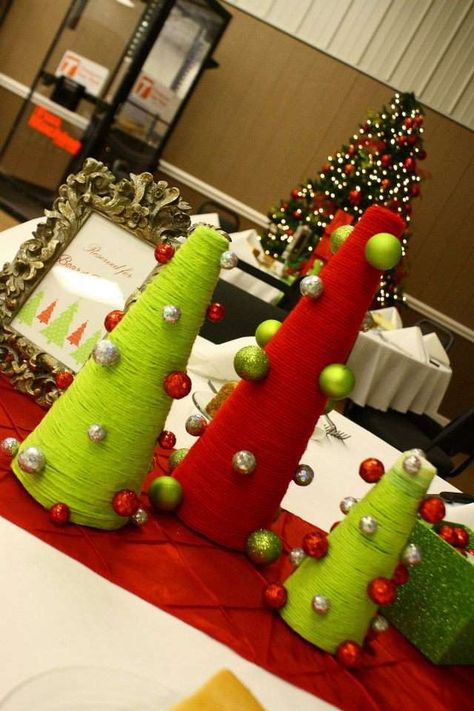 diy-yarn-centerpice-for-christmas-table - Home Decorating Trends - Homedit Ward Christmas Party, Diy Christmas Party, Grinch Decorations, Grinch Christmas Party, Whoville Christmas, Grinch Party, Grinch Christmas Decorations, Christmas Party Themes, Grinch Stole Christmas