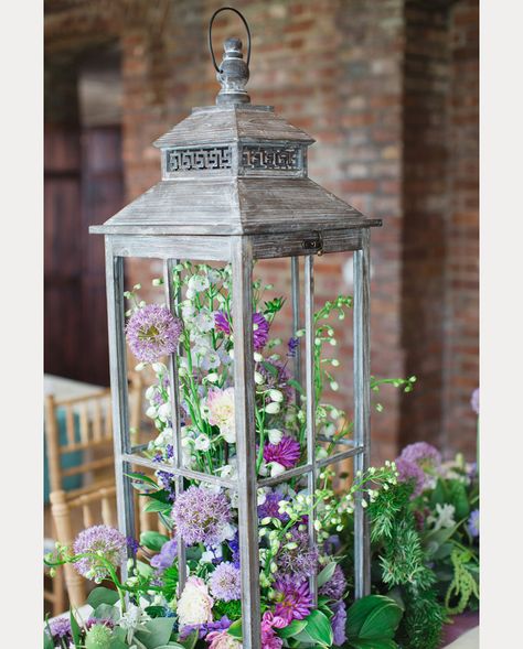 30 Gorgeous Ideas For Decorating With Lanterns At Weddings - Mon Cheri Bridals Flower Arrangements In Lanterns, Diy Decorative Lanterns, Flowers In Lanterns, Decorating Ideas For Lanterns, Decorating Lanterns Ideas For Spring, What To Put Inside Lanterns Decor, Plants In Lanterns, What To Put In A Lantern, Decorating A Lantern Ideas