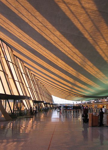 Washington Dulles International Airport (IAD), Sterling, Viriginia. Serving the District of Columbia, USA. Washington Dulles International Airport, Plane Window View, Airport Architecture, Dulles Airport, Dulles International Airport, Lounge Interiors, Airport Terminal, Airport Design, Airport Lounge