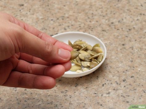 3 Ways to Shell Pumpkin Seeds - wikiHow How To Remove Pumpkin Seeds From Shell, How To Shell Pumpkin Seeds, Shell Pumpkin, Shelled Pumpkin Seeds, Roasted Pumpkin Seeds, Green Pumpkin, Did You Eat, Savory Snacks, Sunflower Seeds