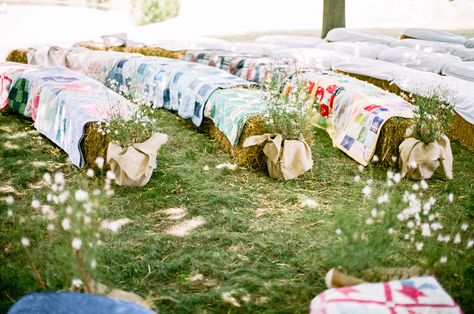 Hay Bale Ceremony Seating Covered with Quilts Quilts On Hay Bales, Haybail Seating Wedding, Hay Bails For Wedding Seating, Straw Bales Wedding, Hay Bales Wedding Seating, Hay Bale Seating Wedding, Small Country Weddings, Wedding Aisle Decorations Outdoor, Hay Bale Wedding