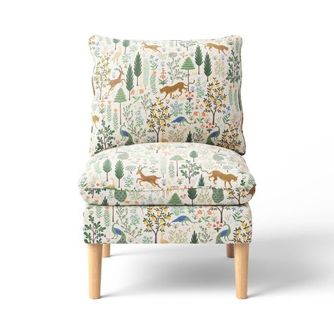 Add distinctive style to your space with this Accent Chair from Rifle Paper Co. x Target. This armless chair features a wood frame with light wood legs and beautiful floral upholstery. The extra-padded seat and back covered in cotton fabric help keep you comfortable, and the unique look makes for a charming focal point in any room. Rifle Paper Co. is a stationery and lifestyle brand based in Winter Park, Florida, founded in 2009 by husband-wife team Nathan and Anna Bond. Anna’s hand-painted illu Target Ottoman, Target Furniture, Anna Bond, Armless Accent Chair, Winter Park Florida, Floral Upholstery, Upholstered Accent Chairs, Swivel Accent Chair, Wood Arm Chair