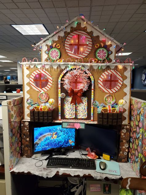 Christmas Cubicle/Desk Decoration. I made this DIY Gingerbread House with lots of cardboard, paper, paint, and Dollar Tree finds :)  #office #christmasdecor #holidaydesk #gingerbreaddesk #christmasdesk #christmas #xmas #winter #deskdecorations #diy #artsandcrafts #crafts #homemade #artist #art #candy #candyland #Christmascubicle #holidaycubicle #cubicle #desk #dollartree #michaels #gingerbread #gingerbreadman #gingerbreadhouse #gumdrops #lollipops #gummybears #wreath #chocolate #chocolates Ginger Bread House Desk, Ginger Bread Cubicle Decorations, Desk Gingerbread House, Gingerbread House Work Cubicle, Candy Land Cubicle Ideas, Gingerbread Desk Decorations, Cubicle Gingerbread House Office, Desk Decorating Christmas, Gingerbread House Desk Decorations