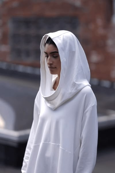 A masterwork in minimalist edge, our Firenze Hoodie is distinguished by a veil-like hood that brings the drama whether worn up or down. Crafted from light European sweatshirt fabric, she features an ultra-relaxed fit perfected by dropped shoulders and an elevated back that dips. Thumbholes keep the sleeves pinned to your wrist for a cozy, finishing touch. Firenze is as easy to maintain as to wear: effortless to clean, structured to last, doesn't pill. [SPLIT] Maritza, in anthracite and in espres Fitness Wear Outfits, Sweatshirt Fabric, Hoodie Outfit, White Boots, The A Team, Winter Clothing, Summer Clothing, Custom Dresses, White Hoodie