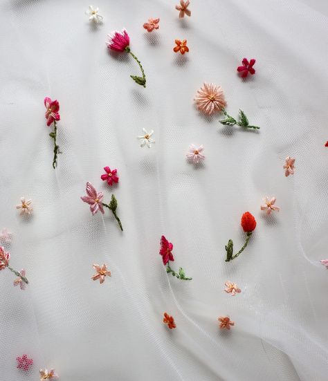 a close up of embroidered flowers for a wedding veil in shades of orange and hot pink features daisies and blossoms Embroidered Wedding Veil, Orange And Hot Pink, Floral Veil, Unique Bride, Embroidered Wedding, Flower Wedding, Bespoke Wedding, Wedding Veils, Wedding Veil