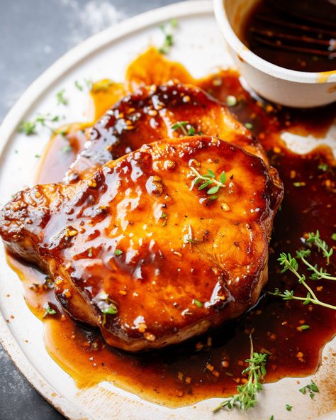 Indulge in the exquisite flavors of Honey Garlic Pork Chops—a delectable blend of sweet & savory! Quick to prepare in just 30 mins, it's perfect for busy weeknights. Try this mouthwatering recipe and treat your taste buds to a symphony of tastes! Try it tonight and create a memorable meal for your loved ones! Honey Teriyaki Pork Chops, Honey Garlic Pork Chop Marinade, Honey Garlic Pork Bites, Hot Honey Pork Chops, Honey Pork Roast, Maple Glazed Pork Chops, Honey Glazed Pork Chops, Teriyaki Pork Chops, Honey Pork Chops