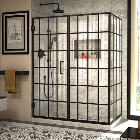 The DreamLine Unidoor Toulon is a frameless swing shower door or enclosure designed in step with modern market trends. The Toulon has a stylish window pane look and a satin black finish that is bold and striking in any bathroom. The glass pattern is made using an application of JetGlaze durable paint, offering a unique mullion look, without the metal framing for easy maintenance. DreamLine exclusive ClearMax water and stain resistant glass coating adds superior protection from stains and is near Dreamline Shower, Shower Door Designs, Black Shower Doors, Frameless Hinged Shower Door, Shower Door Installation, Modern Market, Frameless Shower Enclosures, Hinged Frame, Shower Base