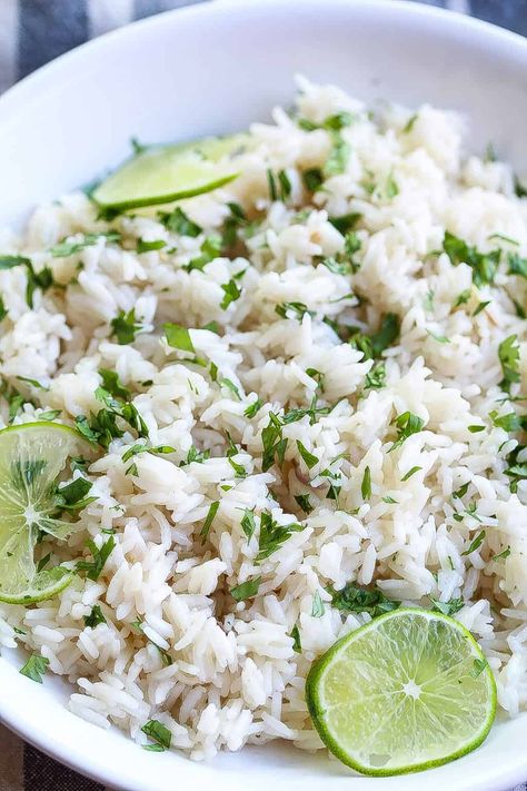 coconut ginger rice in a bowl and topped with limes and cilantro Coconut Ginger Rice, Ginger Rice Recipe, Ginger Rice, Rice Recipes Vegan, Coconut Ginger, Rice Recipes For Dinner, Vegan Rice, Rice Dinner, Ginger Recipes