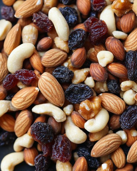 This trail mix is a lifesaver for road trips or busy days! Everyone loves the crunch of the nuts and the sweetness of the dried fruit. So easy to make, and it's perfect for munching!  Ingredients:  - 1 cup mixed nuts (like almonds, peanuts, or cashews) - 1 cup assorted dried fruits (like raisins, cranberries, or apricots) - 1/2 cup chocolate chips (or yogurt-covered raisins for a twist)  For the full recipe details, check the link in the first comment [👇] [👇]  Try this for your next adventure, and watch everyone fall in love with it! It really is the best snack for sharing or keeping all to yourself!   #TrailMix #HealthySnack #NutsAndFruits #DIYSnack #Yum Trail Mix Aesthetic, Homemade Trail Mix Recipes, Nuts And Dried Fruit, Yogurt Covered Raisins, Dried Raisins, Happy Weight, Trail Mix Recipes, Vegetables Photography, Homemade Trail Mix