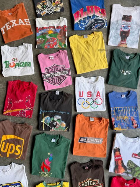 Time to upgrade your tee game with our vintage collection! From iconic logos to vintage graphics, we've got the looks that'll make you stand out. Tap to shop now and embrace the nostalgia! #VintageTees #RetroStyle Clothing Flatlay, Thrifting Outfits, Flatlay Ideas, New Wardrobe Ideas, Streetwear Tees, Insta Post Ideas, Clothing Brand Logos, Walk Down Memory Lane, Color Combinations For Clothes