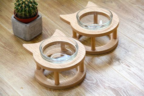 Price for 1pc bowl stand with glass bowl.   Suitable for cats and small dogs. The feder stand is made of wood with oak veneer. All products are natural and eco friendly.  The surface is treated with a water-repellent composition in three layers on a natural basis.  Glass bowls are easy to remove. Glass bowls included. Easy to wash and look stylish. Material - shockproof glass. Rubber legs are mounted below. Thanks to which the stand does not slide on the floor. Fast delivery in only 8-25days Sta Pet Bowls Stand, Pet Bowl Stand, Cat Bowl Stand, Cat Feeding Station, Cat Water Bowl, Modern Cat Furniture, Cat Food Bowl, Cat Feeder, Cat Bowl