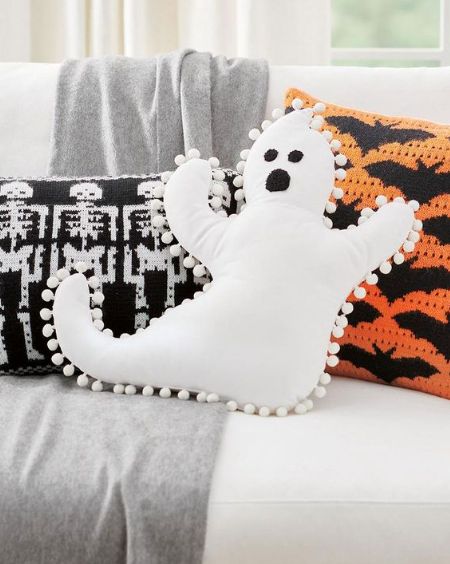 Another one of the cute ways to decorate for Halloween is to use throw pillows. Throw pillows are an easy way to change out your decor from season to season. You can buy throw pillows in different Halloween shapes such as ghosts, bats, pumpkins, etc. Or considering using Halloween themed pillows covers over your existing pillows. You can find pillow covers with various Halloween patterns and prints. Or consider using plain orange, black or purple pillow covers for your throw pillows. Floating Candles Halloween, Spooky Letters, Halloween Throw Pillows, Ghost Pillow, Halloween Mantel, Scary Decorations, Halloween Throw Pillow, Shaped Pillow, Grandin Road