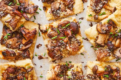 In this recipe, the secret to achieving crispy, not soggy, mushrooms is roasting them twice: first, alone on a sheet pan until they’re just tender and their moisture reduced, then again on top of a soft and fluffy focaccia dough, where they will brown and crisp For a vegan version, skip the Parmesan and use flaky salt or nutritional yeast instead. Self Rising Flour Foccacia, Foccacia Bread Mushroom, Mushroom Focaccia, Crispy Gnocchi And Mushrooms, Toadstool Focaccia, Pizza Tart, Mushroom Ricotta Pizza, Focaccia Dough, Bread Dips