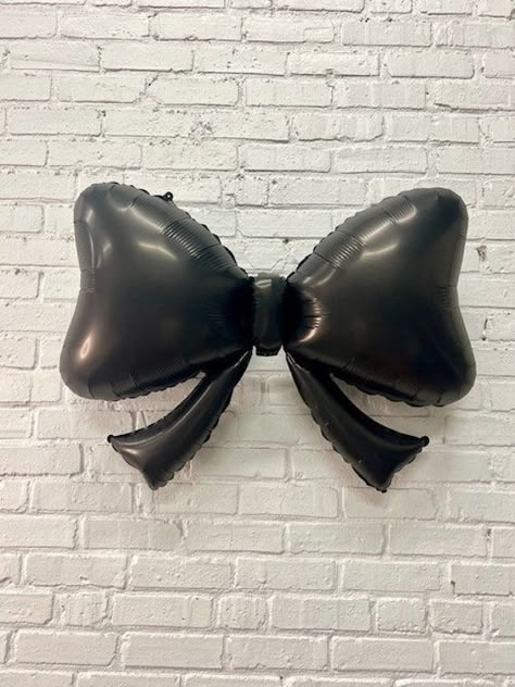 Bows are trending! Elevate your decor with our classic bow design in sleek matte black. Fill with air or helium. 40 inches Black And White Bow Party Theme, Nana Themed Party, Black Balloon Centerpieces, Black Bow Baby Shower Theme, Red And Black Theme, Black White Bridal Shower Ideas, Black Tie Decor, Black Bow Birthday Theme, Black Bow Birthday