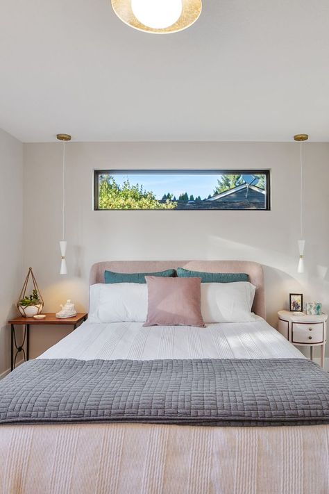 The guest bedroom remodel includes a new clerestory window above the bed, pendant lights beside the bed, carpet, and paint. Bed Pendant Lights, Windows Above Bed, Primary Suite Addition, Window Above Bed, Bed Carpet, Above Bed Ideas, Guest Bedroom Remodel, Guest Bedroom Design, Primary Suite